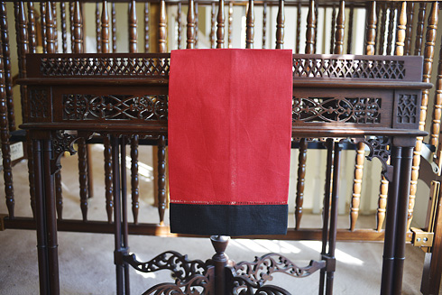 Multicolored Hemstitch Guest Towel. Red & Black colored